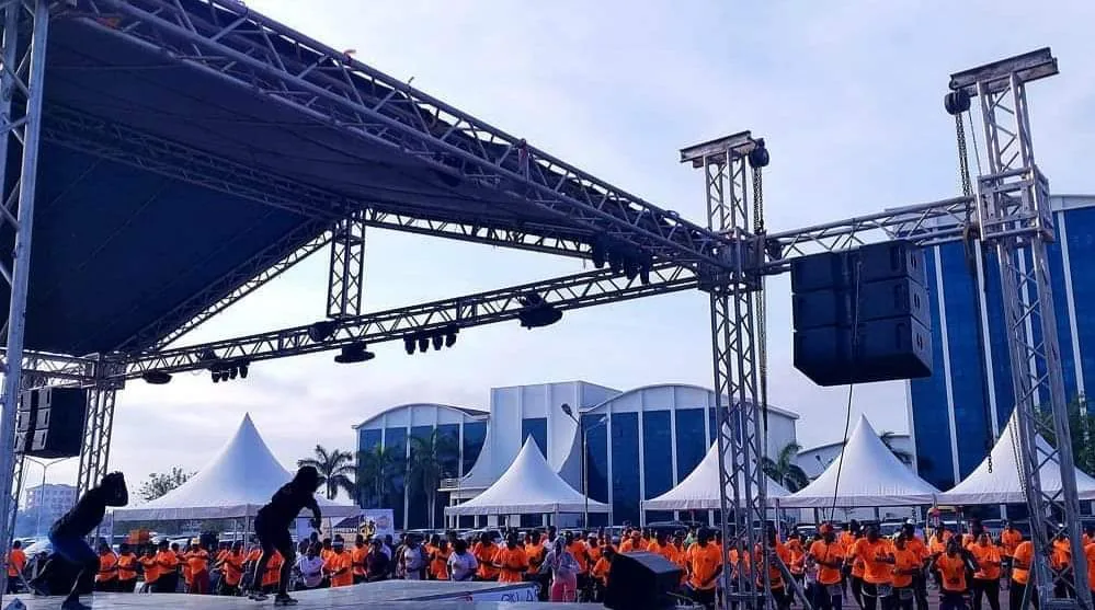 Outdoor stage and truss structure with event visitors