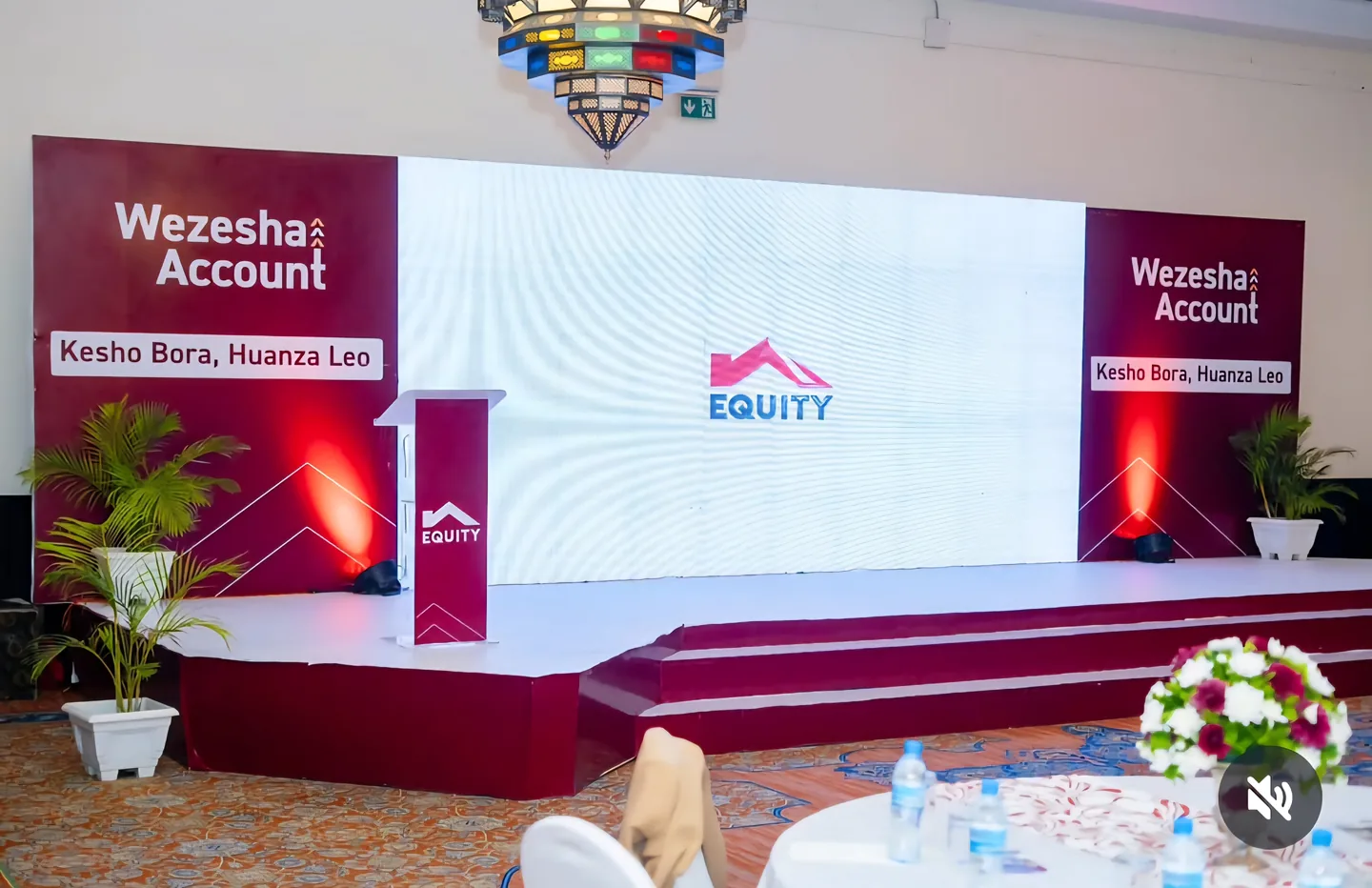 Branded conference stage and seating at an EventMark event