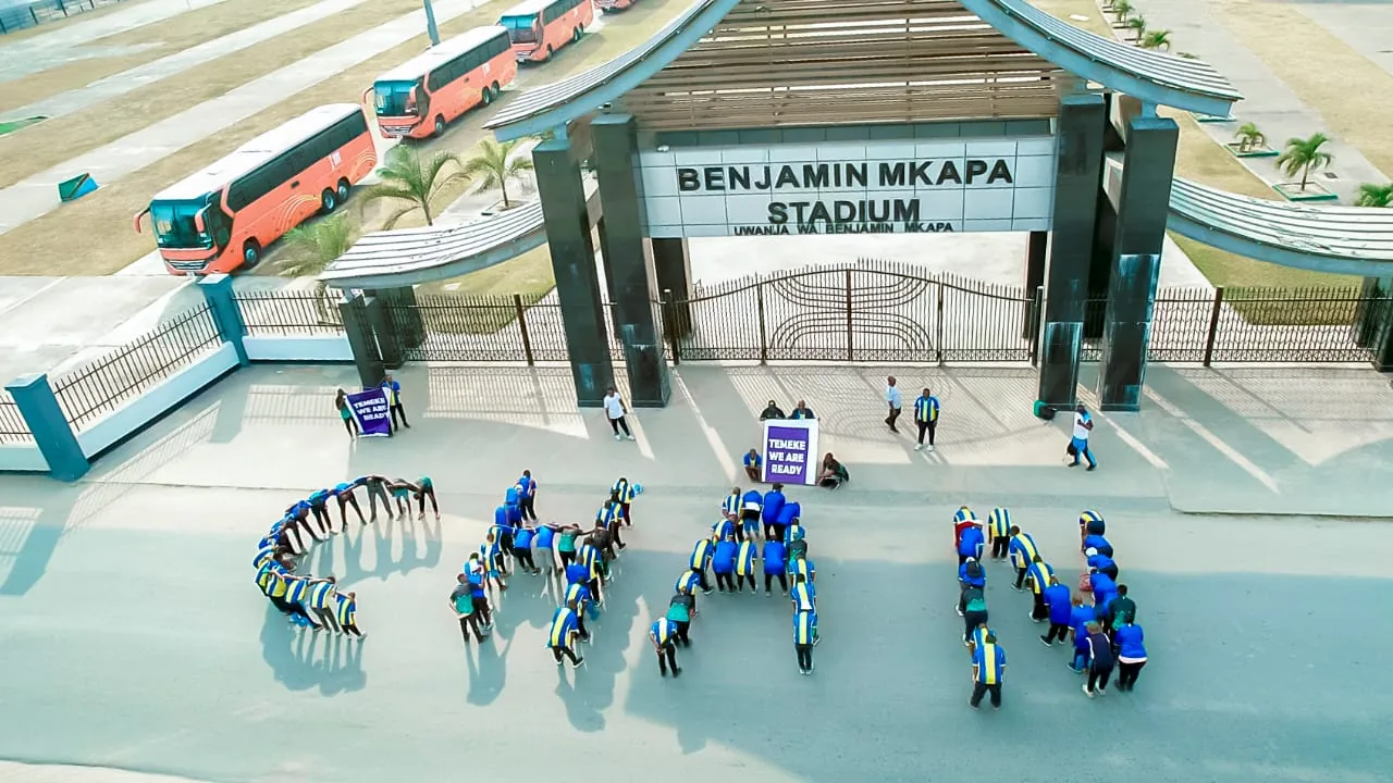 Participants at the entrance to Benjamin Mkapa Stadium